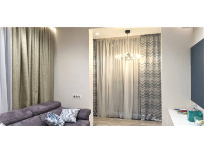 Классические шторы в гостиной фото в интерьере пример 2507